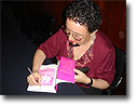 Artist with her book  by Monica        Mayer